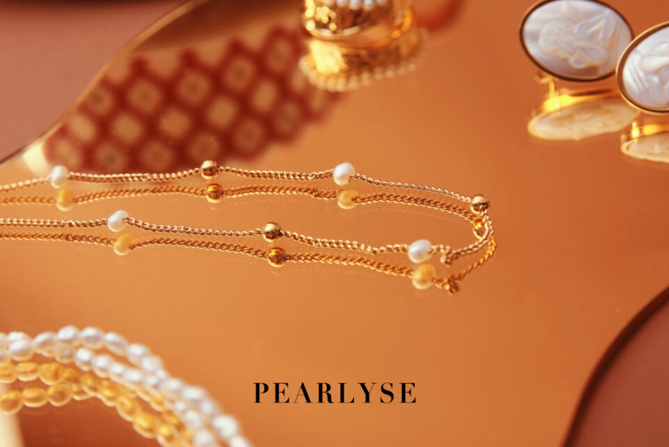 Discover essential tips to identify real pearls, from surface examination to lustre and weight tests. Learn the unique traits of genuine pearls and how to care for them, ensuring the authenticity and preservation of your elegant jewelry.